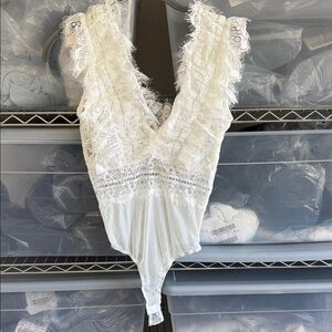 Elegant White Lace Bodysuit